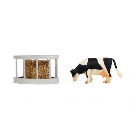 Feeder ring with round bale and cow