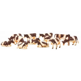 12 cow figurines Brown/White Laying