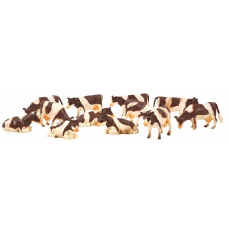 12 cow figurines Brown/White Laying